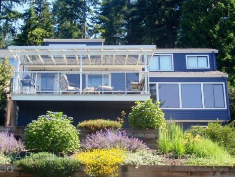 Brighten Up Your Vancouver Patio with a Cover of Glass and Enjoy the Breeze